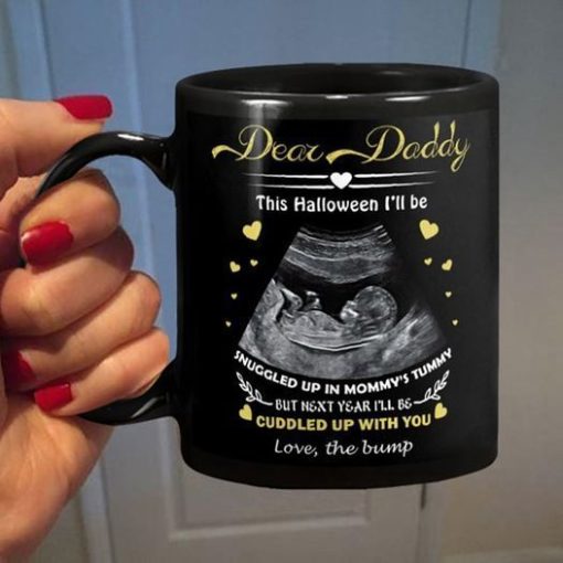 Dear Daddy This Halloween I’ll Be Snuggled Up In Mommy’s Tummy Premium Sublime Ceramic Coffee Mug Black