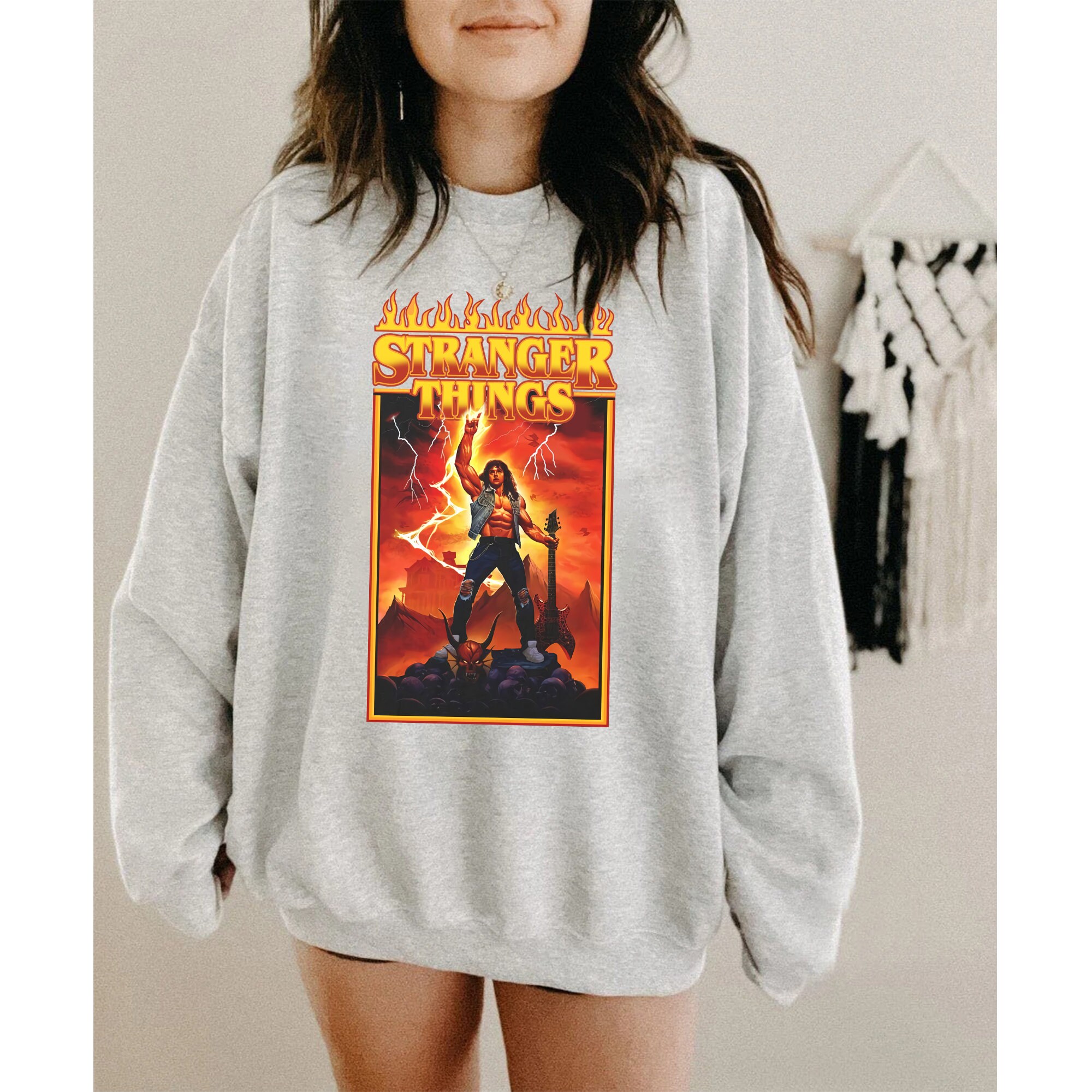 https://teepital.com/wp-content/uploads/2022/06/metal-dude-eddie-stranger-things-eddie-munson-unisex-tshirtvvwcn.jpg