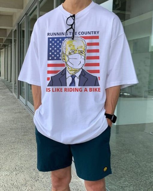 Running The Country Is Like Riding A Bike Funny Biden American Flag Unisex T-Shirt