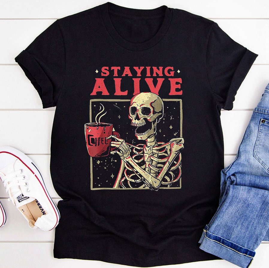 Funny Skeleton Drinking Coffee Staying Alive Spooky Retro Unisex T-Shirt