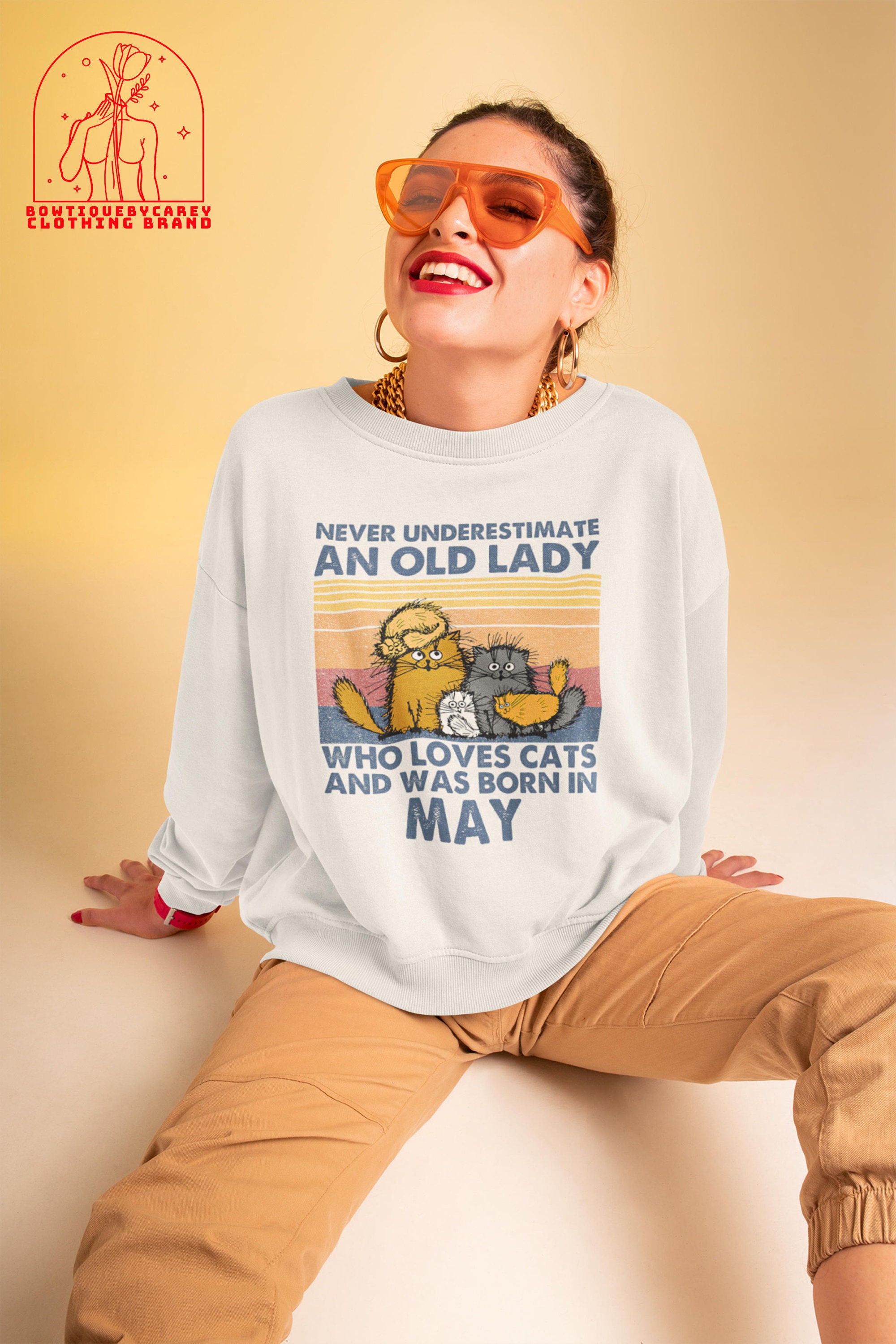 Never Underestimate An Old Lady Who Loves Cats And Was Born In May Unisex T-Shirt