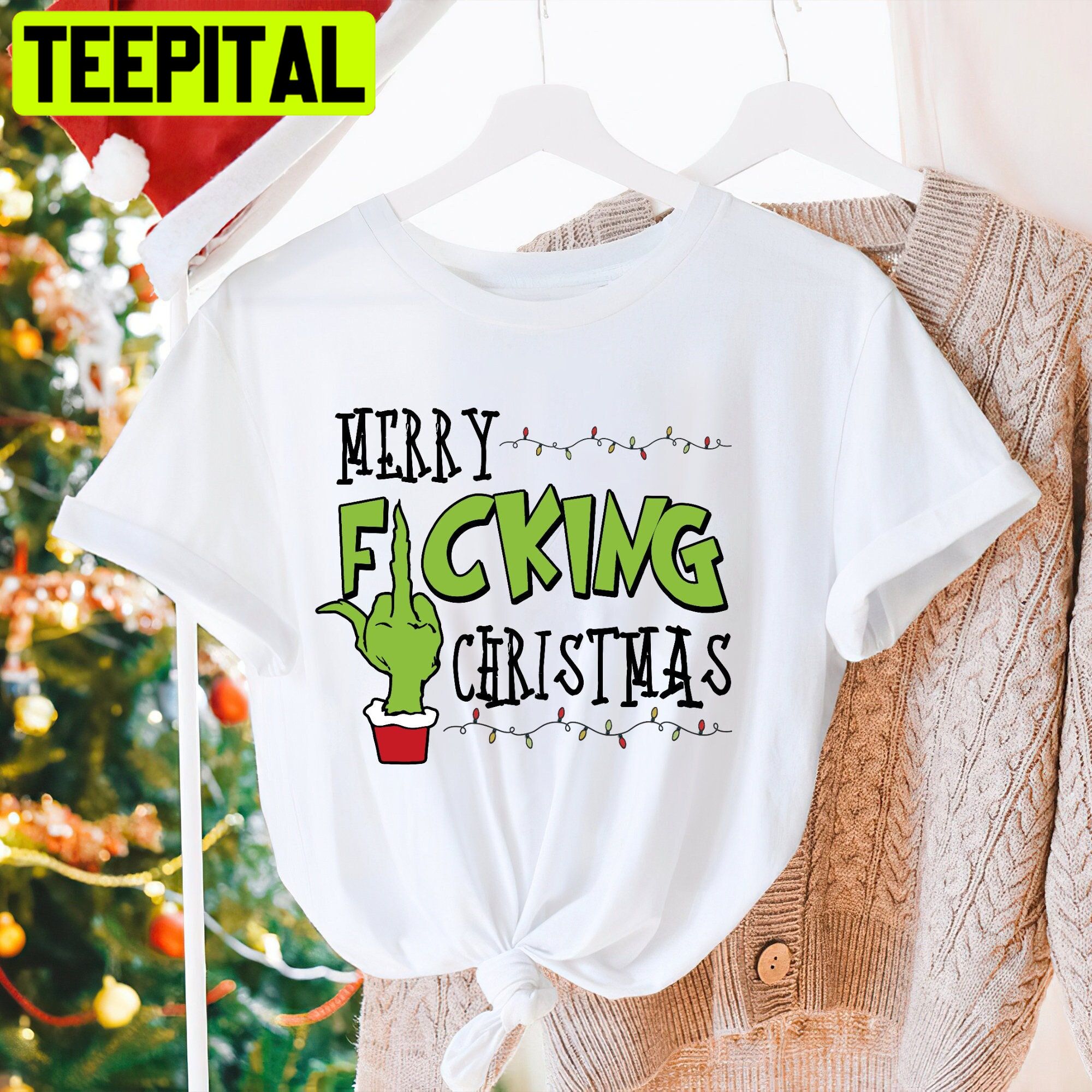 https://teepital.com/wp-content/uploads/2022/08/merry-fucking-christmas-grinch-middle-finger-trending-unisex-shirt4imim.jpg