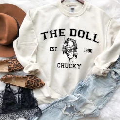 The Doll Est 1988 Chucky Horror Movie Characters Watching Pumpkin Halloween Unisex Sweatshirt